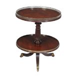 A George IV mahogany two tier whatnot, circa 1825, attributed to Gillows, the circular top with