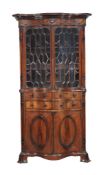 A mahogany secretaire bookcase in George III style, early 20th century, after the manner of Thomas