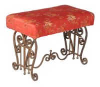 A wrought iron and upholstered stool, late 19th/ early 20th century, the rectangular seat above