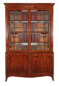 A Regency mahogany bookcase, circa 1815, the stepped moulded cornice above a pair of astragal