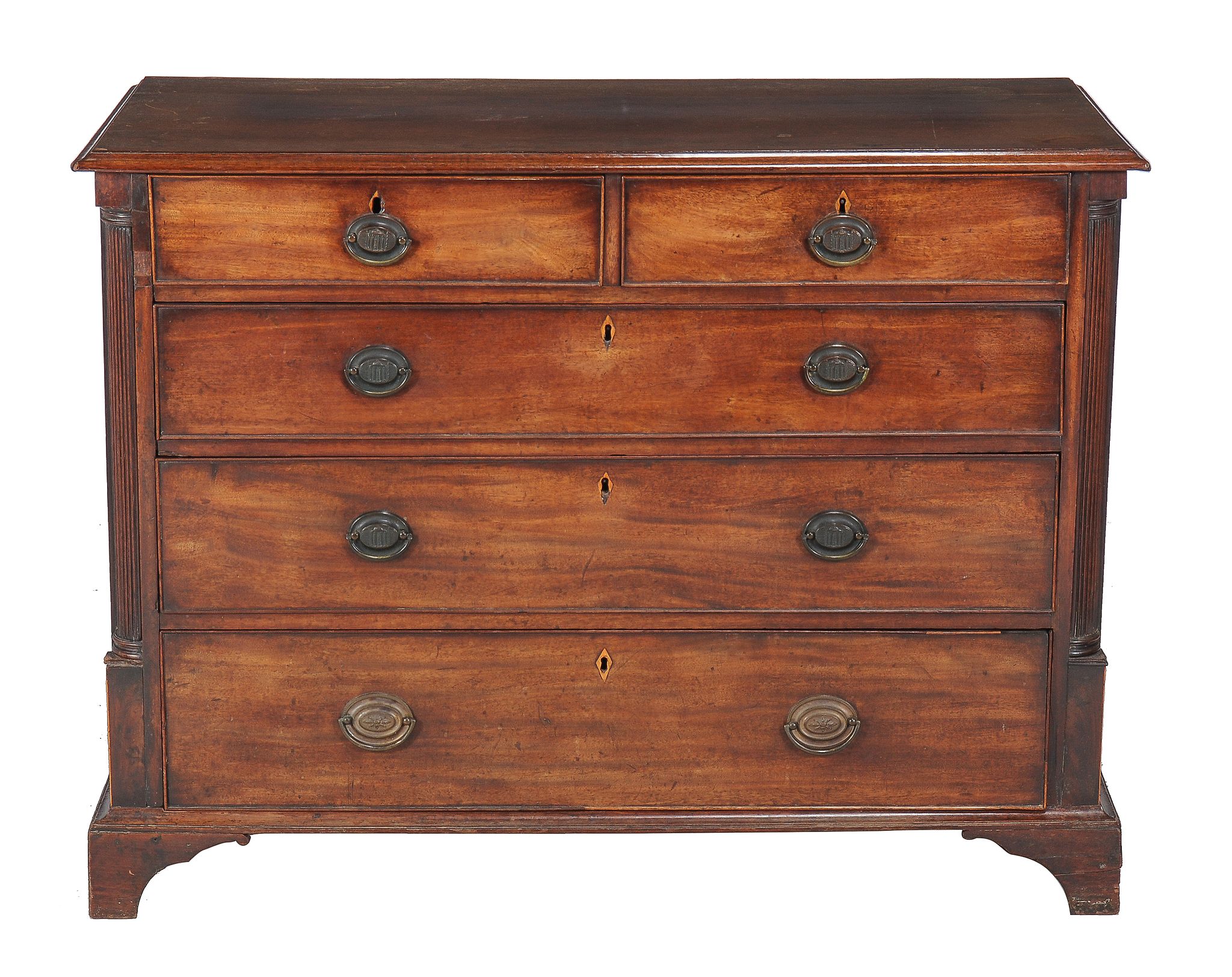 A George III mahogany chest of drawers, circa 1770, the arrangement of drawers flanked by quarter