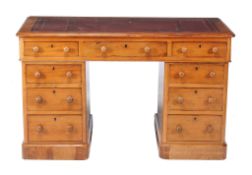 A walnut twin pedestal desk, circa 1900, the inset top above three frieze drawers, each pedestal