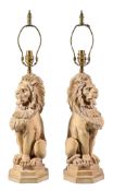 A pair of composition table lamps modeled as seated lions, by Thomas Blakemore, modern, with