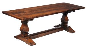 An oak refectory table in 17th century style , probably incorporating period elements, 74cm high,