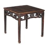 A Chinese stained elm table , early 20th century, 89cm high, the rectangular top 92cm x 97cm