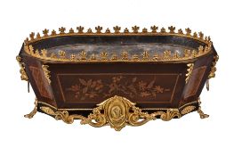 A French mahogany, marquetry and parquetry table-top jardiniere in Louis XVI taste, circa 1900, the