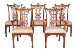 A set of ten mahogany dining chairs in the Chinese Chippendale taste , 20th century, including two