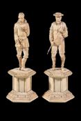 Ω A pair of Continental carved ivory and bone figural models, circa 1870, portraying men standing