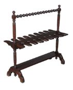 A late Victorian mahogany whip and boot rack , circa 1900, to take eight pairs of boots, 98cm high,