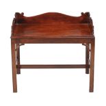 A mahogany butlers tray and stand , late 18th century and later, 64cm high, 74cm wide, 53cm deep