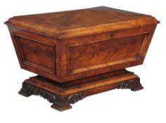 A George IV mahogany wine cooler , circa 1825, of sarcophagus form, 58cm high, 89cm wide, 58cm deep