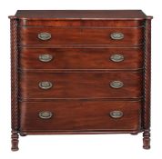 A George IV mahogany chest of drawers, circa 1825, the drawers flanked by spiral turned pilasters,