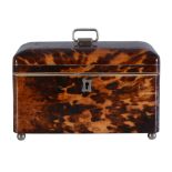 Ω A Victorian tortoiseshell veneered tea caddy, third quarter 19th century, of rectangular form,