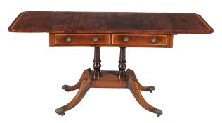 Ω A Regency rosewood and satinwood banded sofa table , circa 1820, with two short frieze drawers to