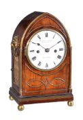 A Regency small brass mounted bracket clock with enamel dial Dwerrihouse and Carter, London, early
