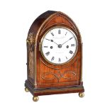 A Regency small brass mounted bracket clock with enamel dial Dwerrihouse and Carter, London, early