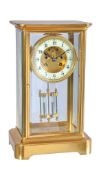 A French gilt brass four-glass mantel clock Japy Freres, Paris, circa 1900 The circular eight-day