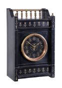 An Aesthetic Movement brass mounted black marble mantel clock Unsigned, circa 1880 The French