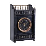 An Aesthetic Movement brass mounted black marble mantel clock Unsigned, circa 1880 The French