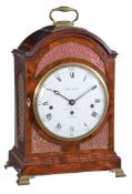 A fine George III brass mounted figured mahogany quarter chiming table clock with fired enamel dial