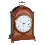 A fine George III brass mounted figured mahogany quarter chiming table clock with fired enamel dial