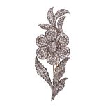 An antique en tremblant diamond brooch, the base leaves set with rose cut and old mine cut