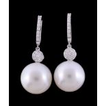 A pair of South Sea cultured pearl and diamond earrings, the 1.5cm South Sea cultured pearl below a