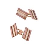 A pair of French gold cufflinks, the double sided cufflinks with rectangular two colour ridged