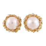 A pair of mabe pearl and diamond ear clips by Garrard & Co , the mabe pearls within a textured