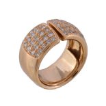 A French diamond dress ring, the broad ring with pave set brilliant cut diamond terminals,