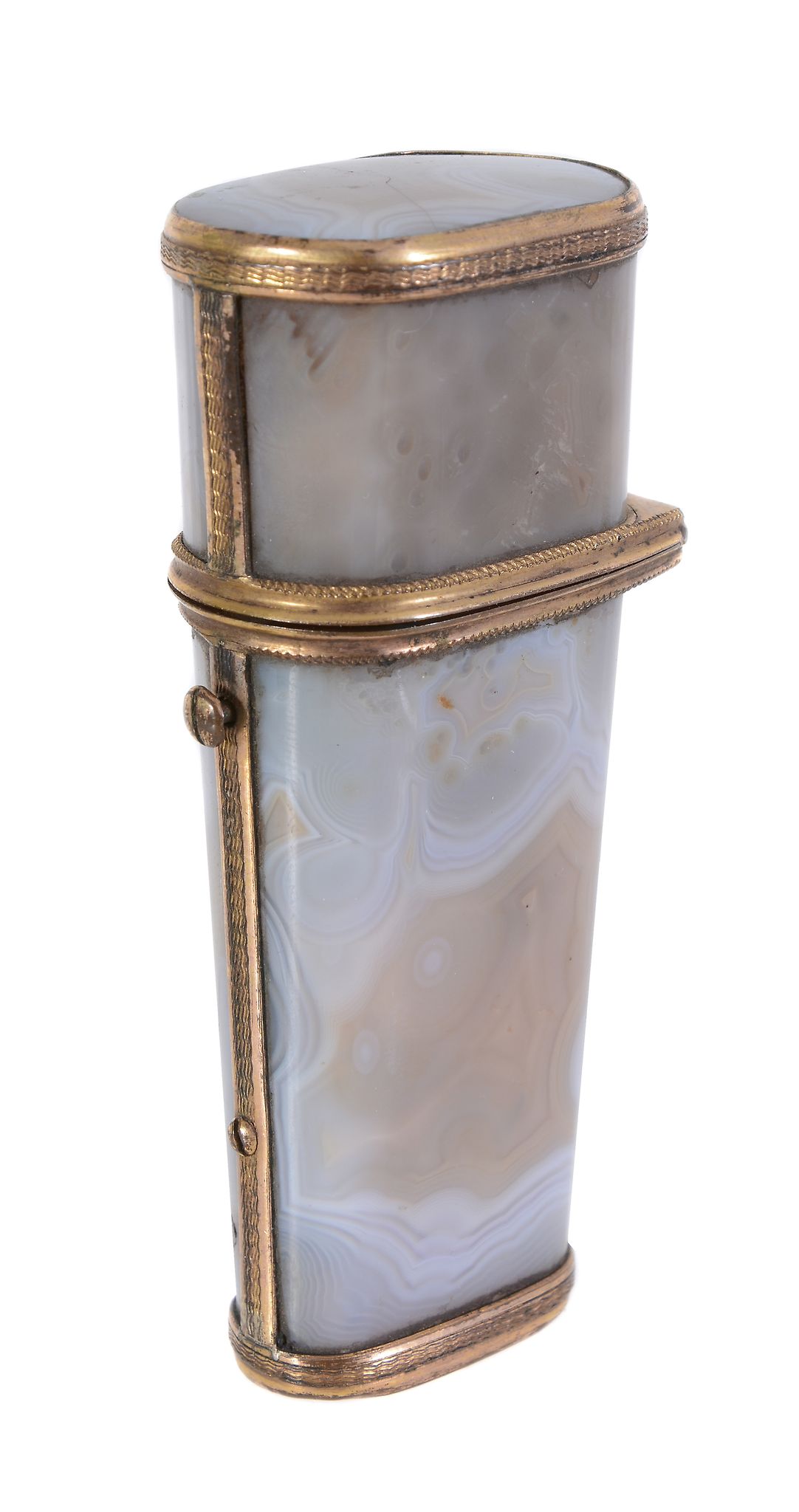 A late 18th century tapered oblong section agate necessaire, gilt metal mounted and containing a