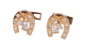 A pair of French 18 carat gold and diamond horseshoe cufflinks by Boucheron, the horseshoe shaped