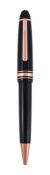 Montblanc, Meisterstuck, Le Grand, 90 years, a black lacquer ballpoint pen, with a gilt metal clip