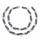 A 1970s diamond, turquoise, lapis lazuli and onyx necklace, the polished shaped lapis lazuli and