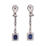 A pair of diamond and sapphire ear pendants , each with a rectangular sapphire and brilliant cut