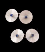 A pair of French Art Deco sapphire cufflinks, circa 1930, the double sided cufflinks with reeded