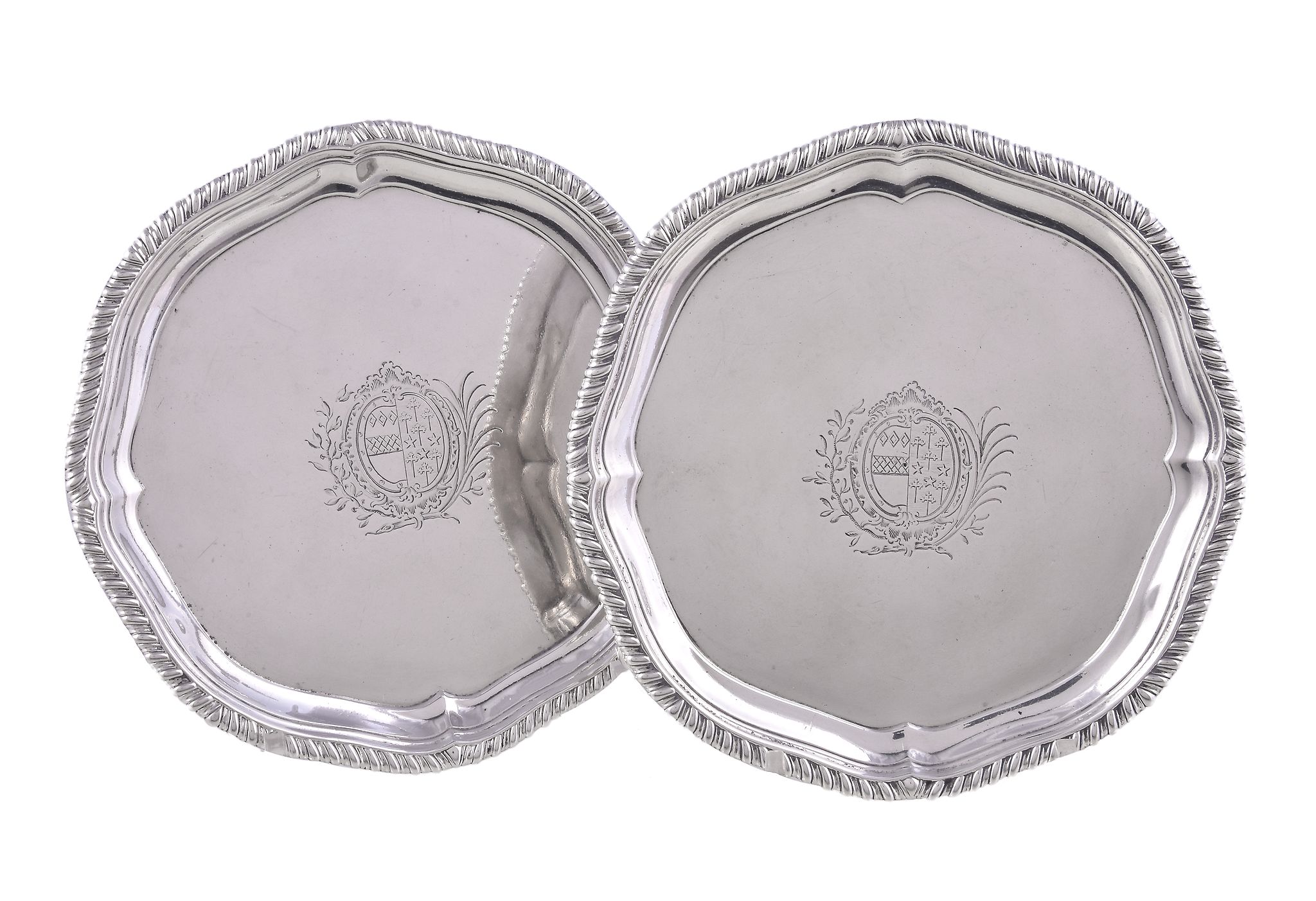 A pair of late George II silver quatrefoil waiters by Edward Wakelin, London 1757, with raised