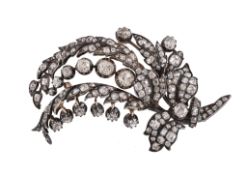 An early Victorian diamond floral spray brooch, circa 1850, the naturalistic spray with leaf fronds