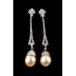 A pair of South Sea cultured pearl and diamond ear pendants, the 1.2cm South Sea cultured pearls