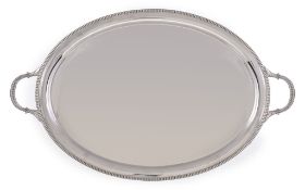 A silver oval twin handled tray by William Hutton & Sons Ltd, Sheffield 1923, with a raised nulled