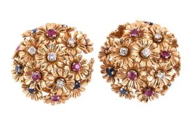 A pair of 1960s diamond, sapphire and ruby bombe flower head ear clips, the dome of en tremblant