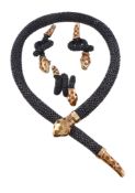 A steel, citrine and diamond serpent necklace, the snake composed of a formation of steel links,