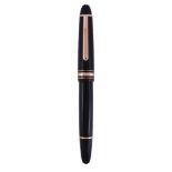 Montblanc, Meisterstuck, Le Grand, 90 Years, a black lacquer rollerball pen, the black cap and