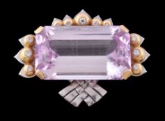 A pink topaz and diamond brooch, the rectangular cut pink topaz in a four claw setting, three sides