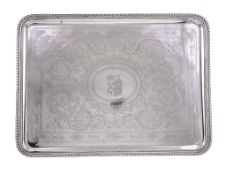 A French silver rounded rectangular tray by Maison Odiot, 1838-1972 .950 standard, stamped Odiot A