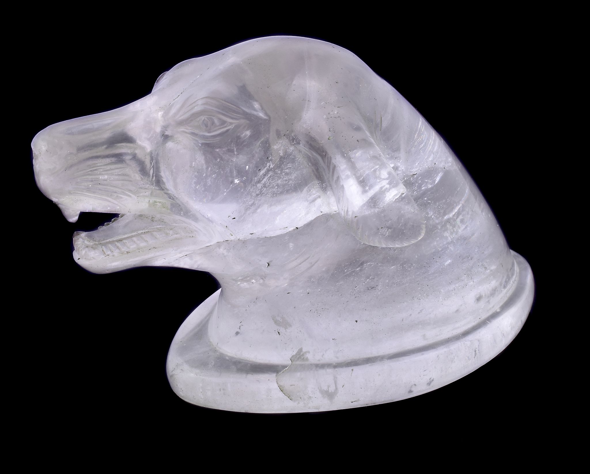 A rock crystal dog's head desk paperweight, probably Continental, late 19th century, carved with an