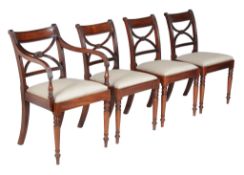 A set of eight Regency mahogany dining chairs, circa 1815, to include a pair armchairs, each shaped