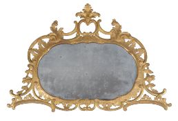 A George III carved giltwood wall mirror , circa 1770, the rectangular shaped plate within a carved