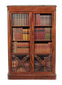 A pair of Louis Phillipe mahogany and serpentine marble mounted cabinet bookcases, circa 1840, each