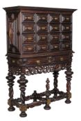 Ω A Portuguese rosewood and gilt metal mounted cabinet on stand, mid 18th century, decorated with